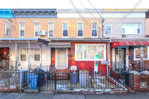a view of a brick building with a large windows