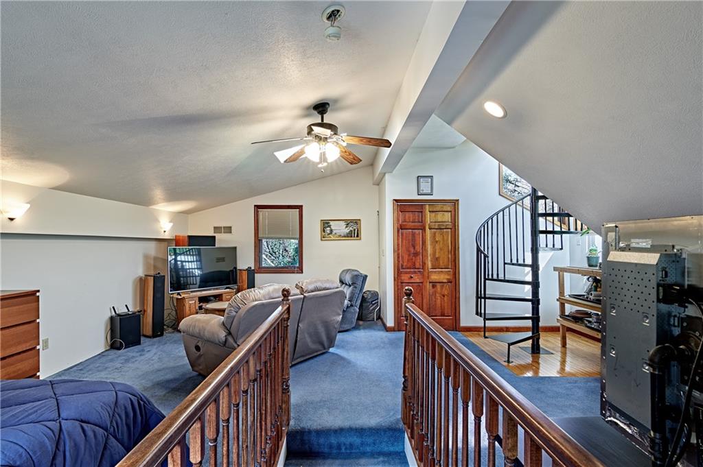 430 Wallace Road Wexford, PA 15090 - Photo 19 of 25 a view of a livingroom with furniture and workspace