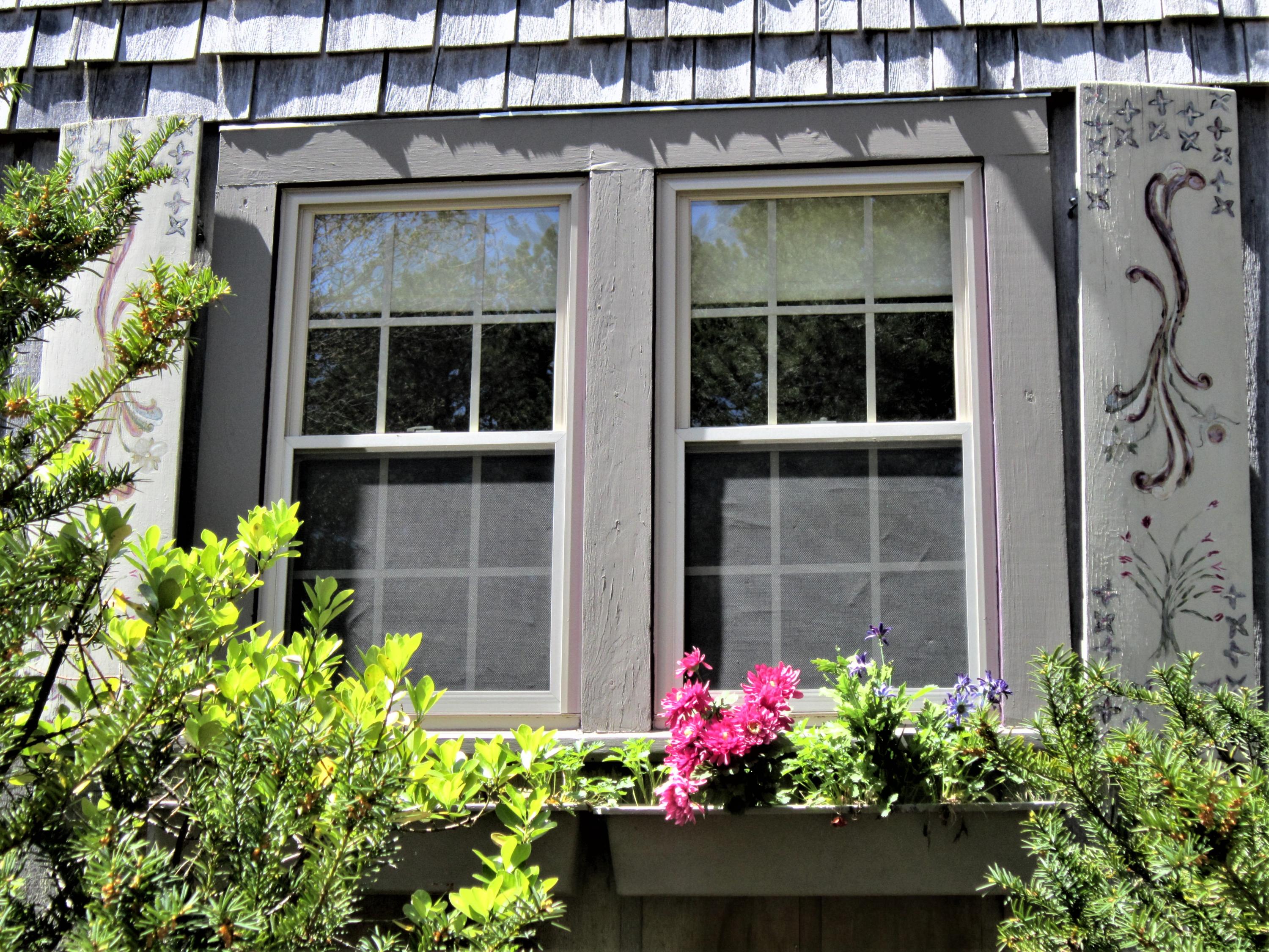 27 Bartlett Road Wellfleet, MA 02667 - Photo 2 of 32 a view of a house with potted plants