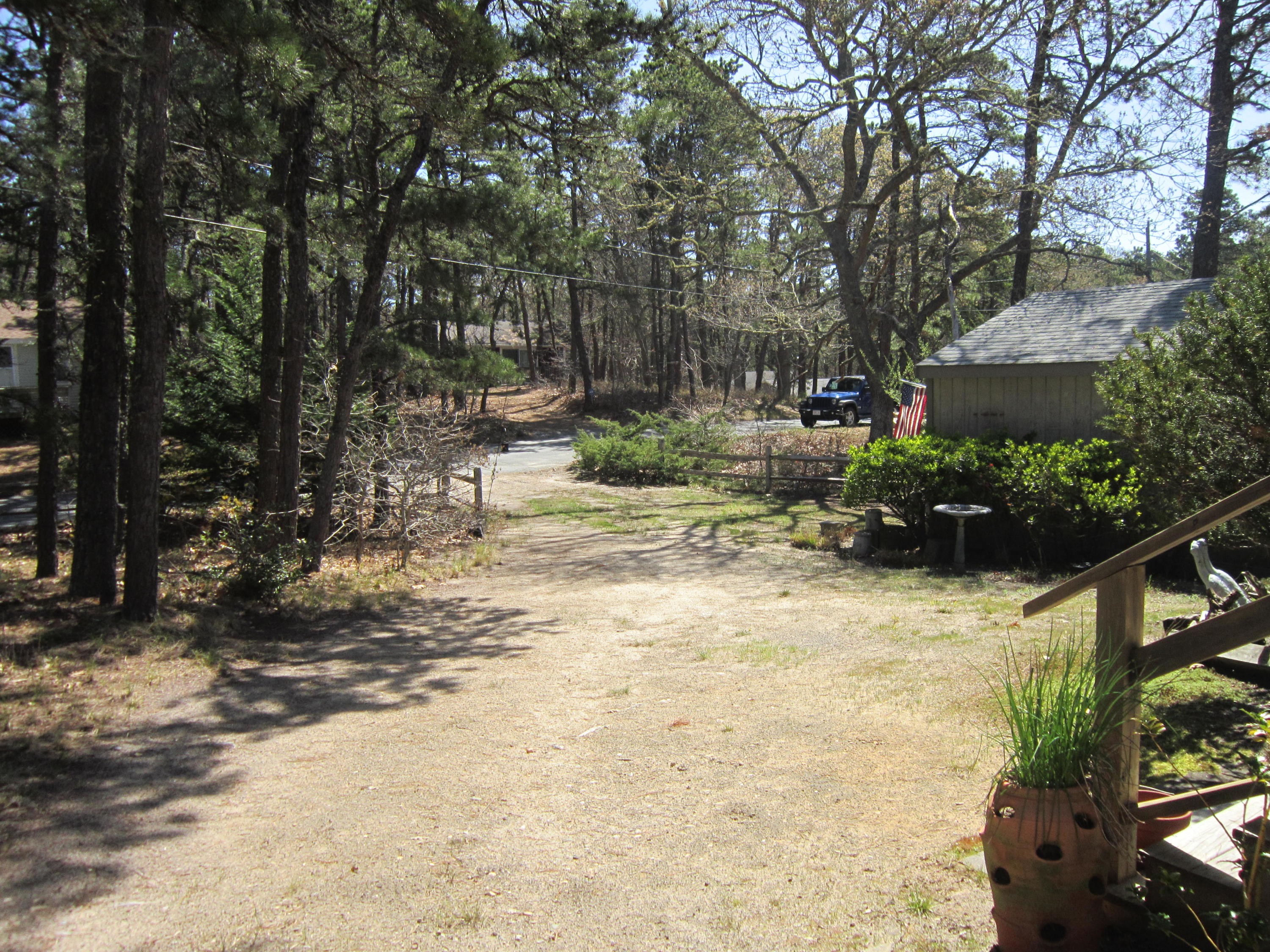 27 Bartlett Road Wellfleet, MA 02667 - Photo 3 of 32 a view of backyard with green space