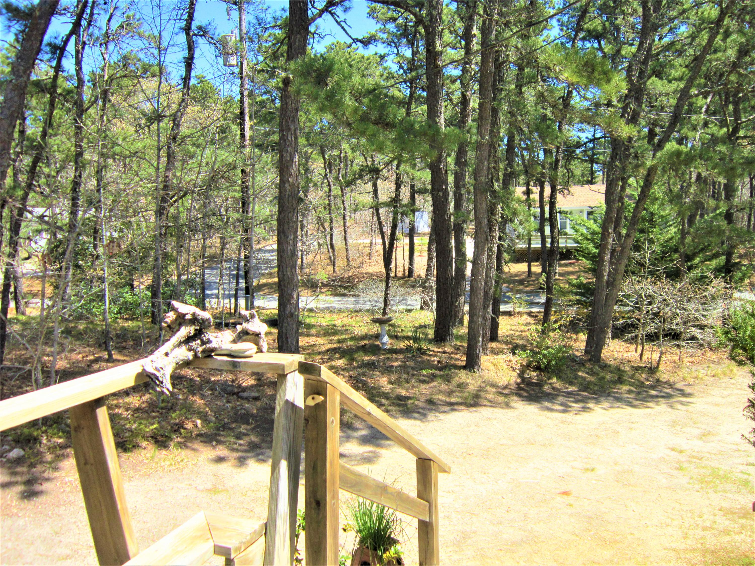 27 Bartlett Road Wellfleet, MA 02667 - Photo 4 of 32 a view of outdoor space with seating area