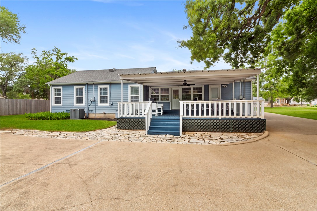 717 Inwood Drive Bryan, TX 77802 - Photo 2 of 48 Large covered back patio deck great space to relax or entertain!