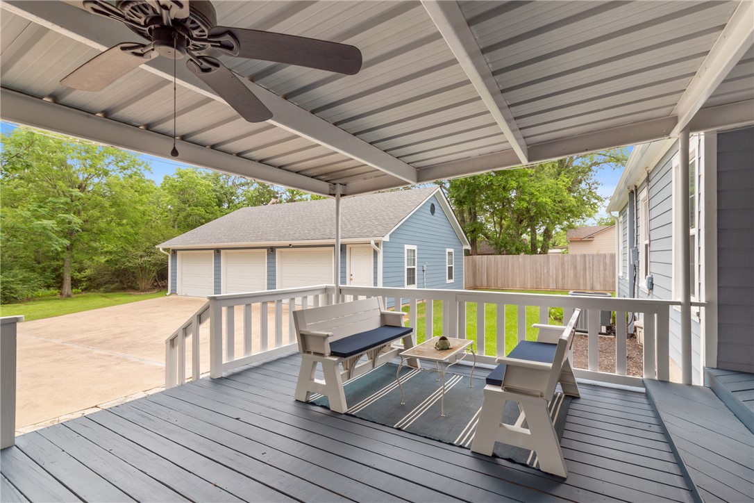 717 Inwood Drive Bryan, TX 77802 - Photo 3 of 48 Rear deck looking out to the garage tucked behind the house.