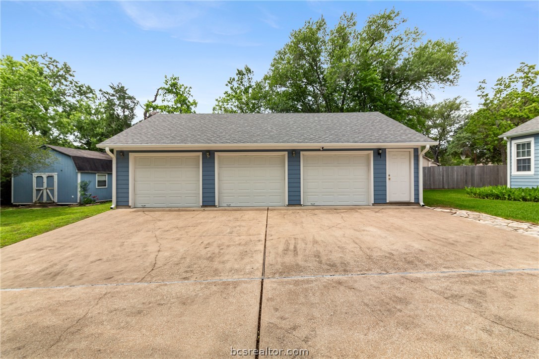 717 Inwood Drive Bryan, TX 77802 - Photo 43 of 48 What a bonus with a large storage shed and huge garage to store all your toys!