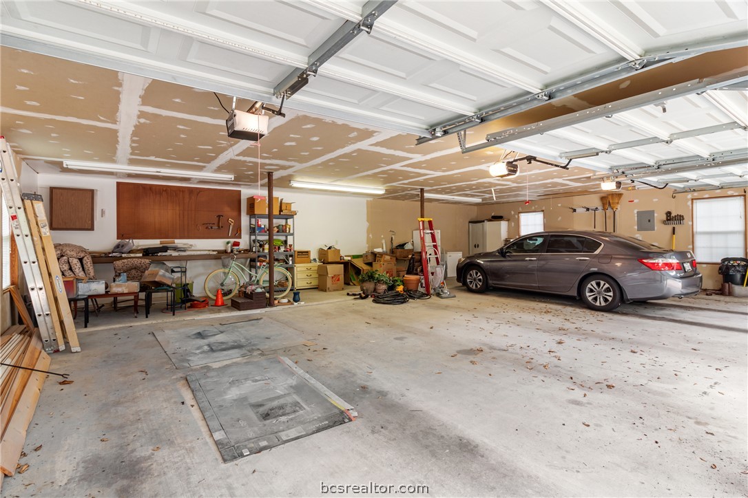 717 Inwood Drive Bryan, TX 77802 - Photo 45 of 48 Small workshop corner inside the six-car oversized garage!