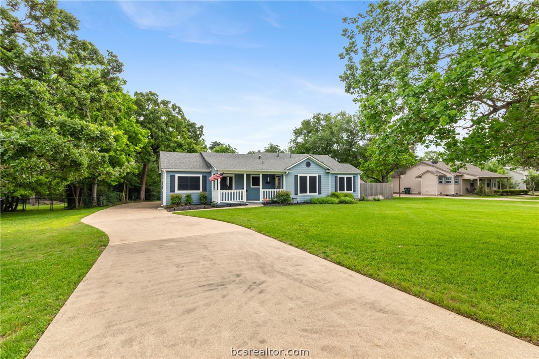 717 Inwood Drive Bryan, TX 77802 - Photo 10 of 48 Large yard and setback from the street.