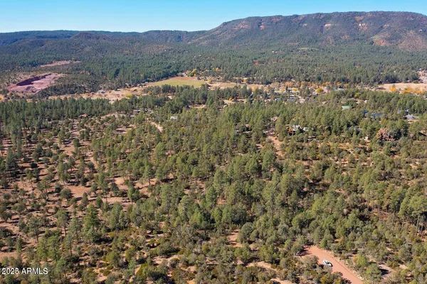 a view of an outdoor space and a mountain