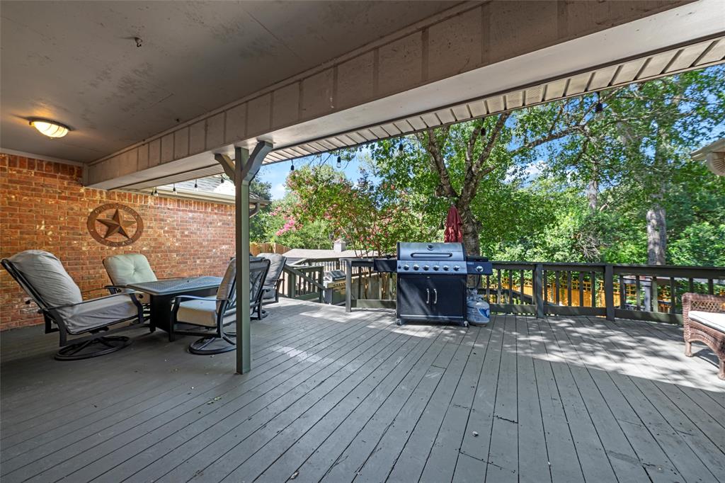 3000 Chimney Hill Drive Waco, TX 76708 - Photo 24 of 37 a view of a balcony with chairs and wooden floor