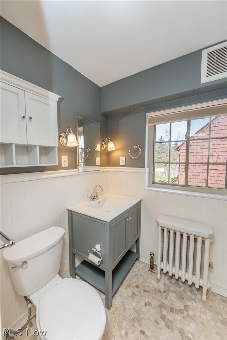 2472 Eaton Road Cleveland, OH 44118 - Photo 25 of 50 Bathroom featuring tile flooring, radiator, toilet, and vanity