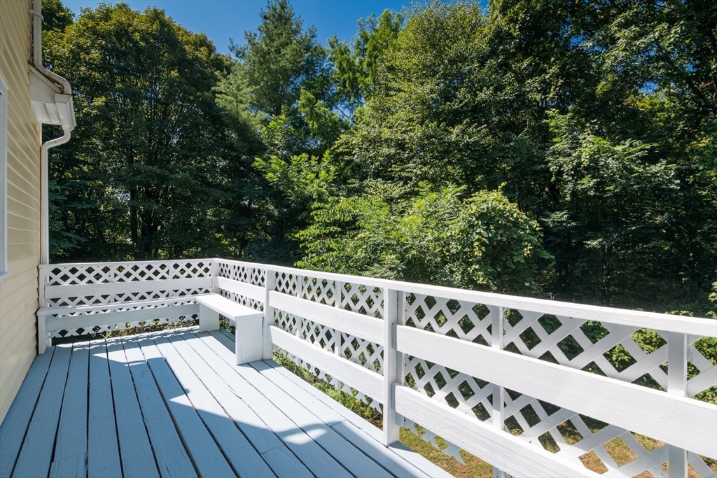 45 Cave Hill Road Leverett, MA 01054 - Photo 14 of 42 a view of wooden deck with trees