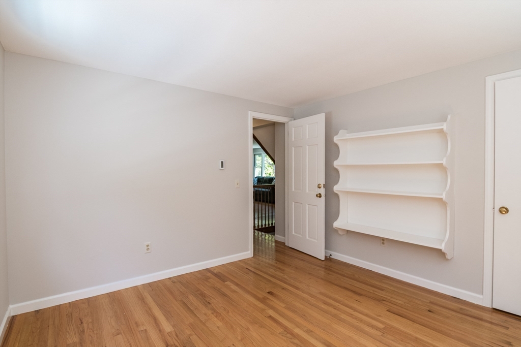 45 Cave Hill Road Leverett, MA 01054 - Photo 21 of 42 a view of an empty room with wooden floor and closet