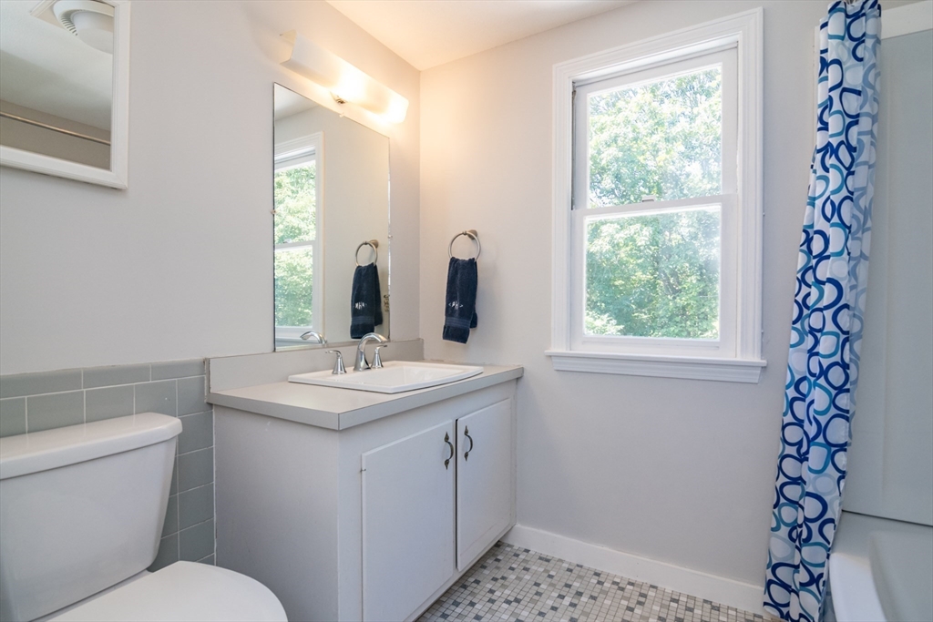 45 Cave Hill Road Leverett, MA 01054 - Photo 27 of 42 a bathroom with a sink toilet and window