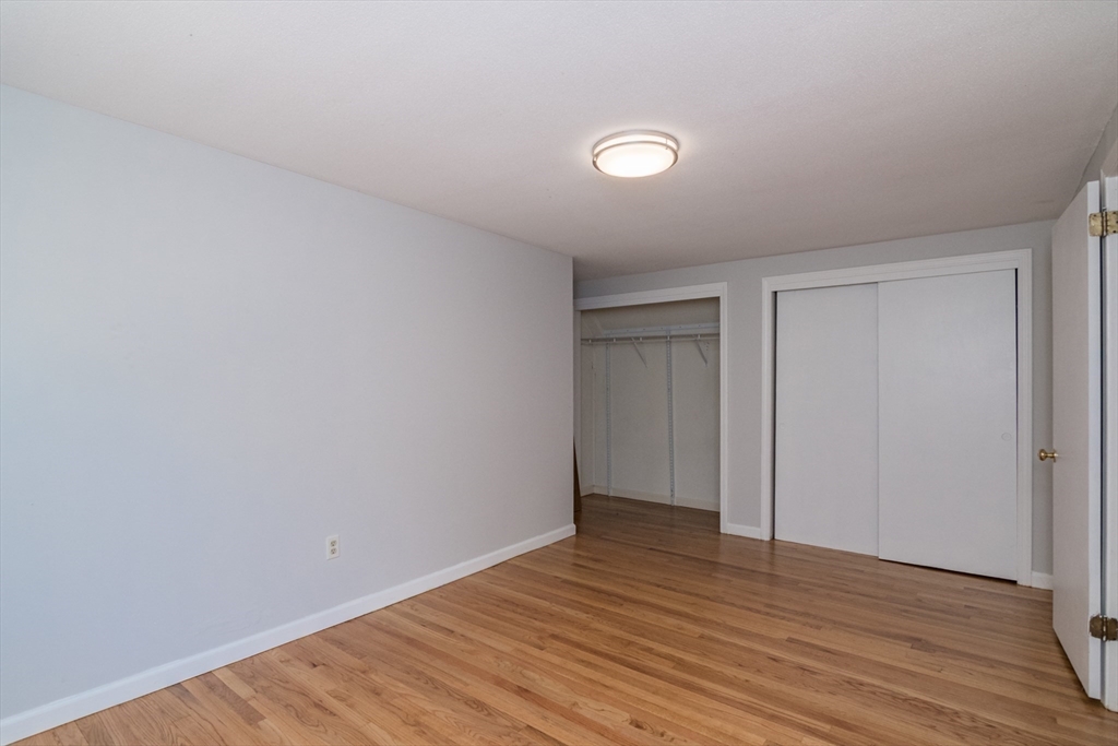 45 Cave Hill Road Leverett, MA 01054 - Photo 29 of 42 a view of an empty room with wooden floor and closet