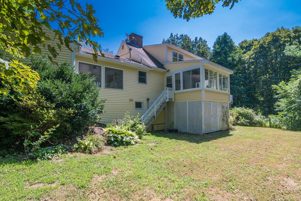 45 Cave Hill Road Leverett, MA 01054 - Photo 3 of 42 a view of a house with a yard