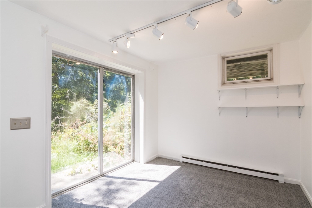 45 Cave Hill Road Leverett, MA 01054 - Photo 33 of 42 a view of an empty room with a window