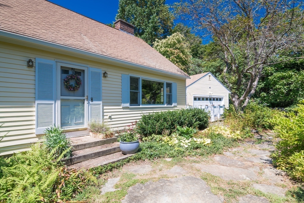 45 Cave Hill Road Leverett, MA 01054 - Photo 39 of 42 a front view of a house with garden