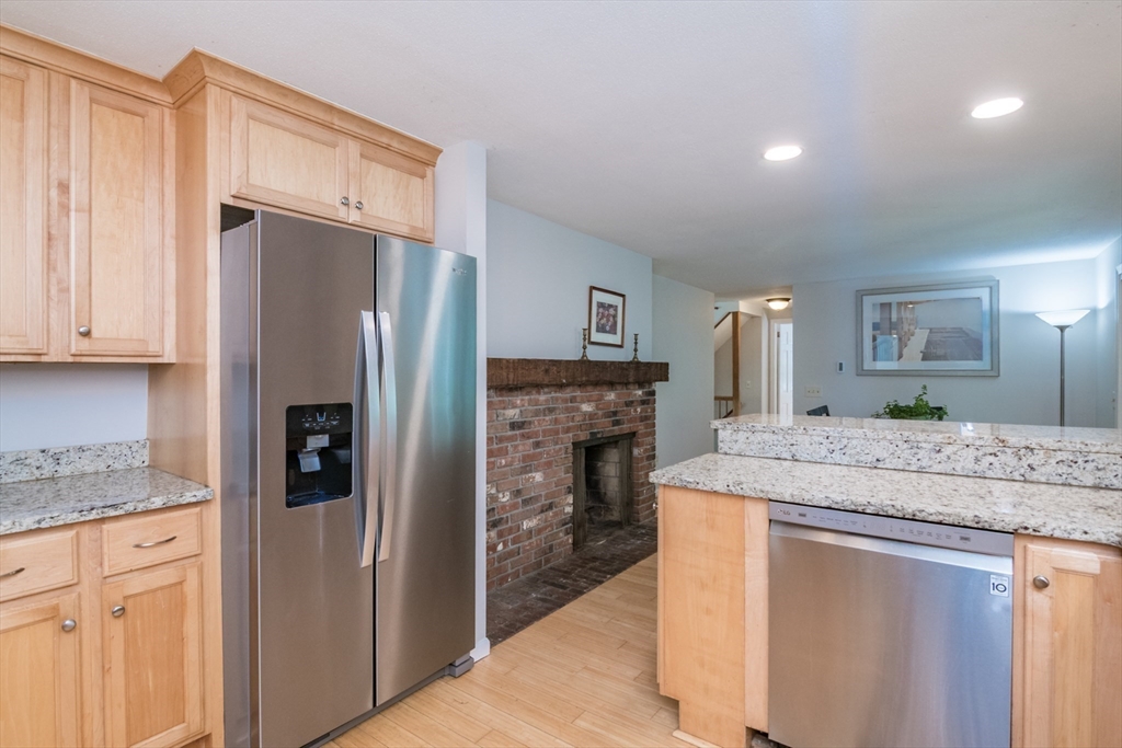 45 Cave Hill Road Leverett, MA 01054 - Photo 5 of 42 a kitchen with stainless steel appliances granite countertop a refrigerator and a stove top oven
