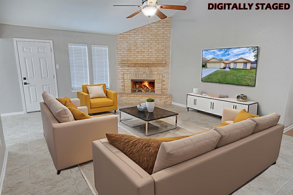 7017 Keystone Drive Corpus Christi, TX 78413 - Photo 13 of 21 a living room with furniture and a flat screen tv