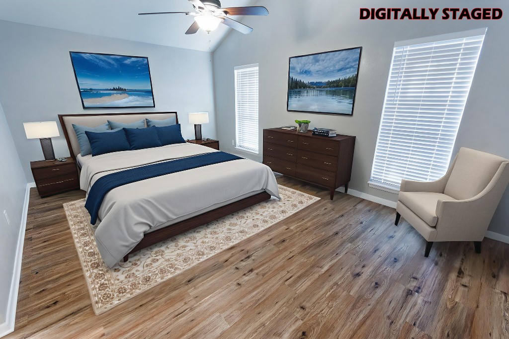 7017 Keystone Drive Corpus Christi, TX 78413 - Photo 17 of 21 a bedroom with bed and wooden floor