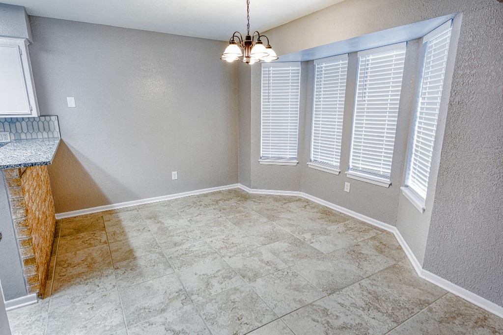 7017 Keystone Drive Corpus Christi, TX 78413 - Photo 7 of 21 a view of an empty room with a window