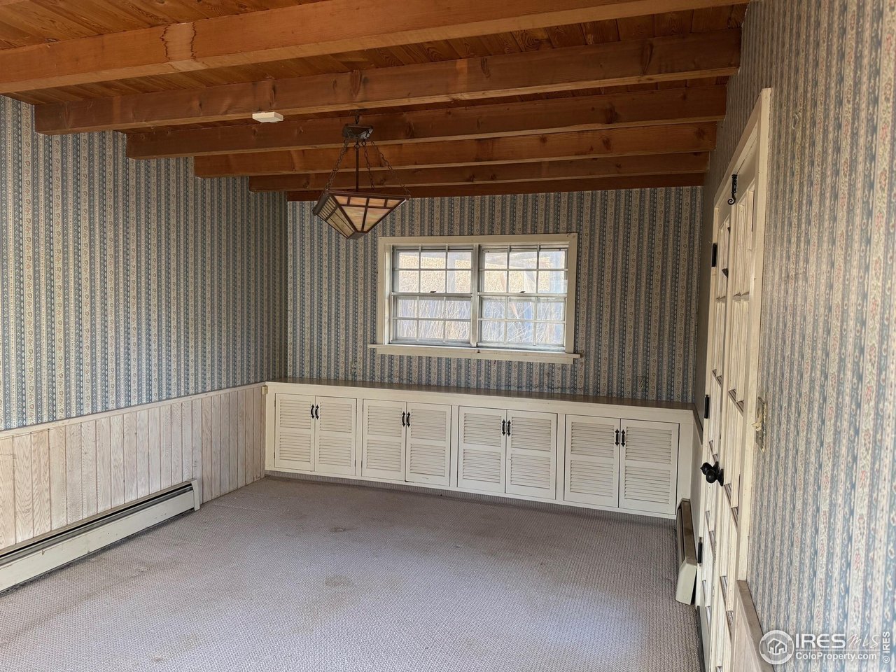 358 Kelly Road East Boulder, CO 80302 - Photo 6 of 16 a view of an empty room with a window