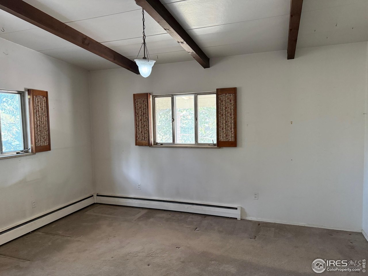 358 Kelly Road East Boulder, CO 80302 - Photo 7 of 16 a view of an empty room