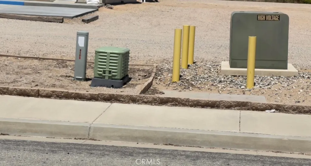 0 South Loop Edwards, CA 93523 - Photo 2 of 14 a front view of a house with a yard and window