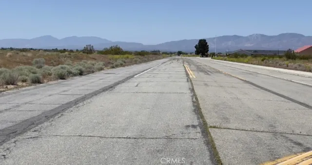 a view of an ocean and mountain
