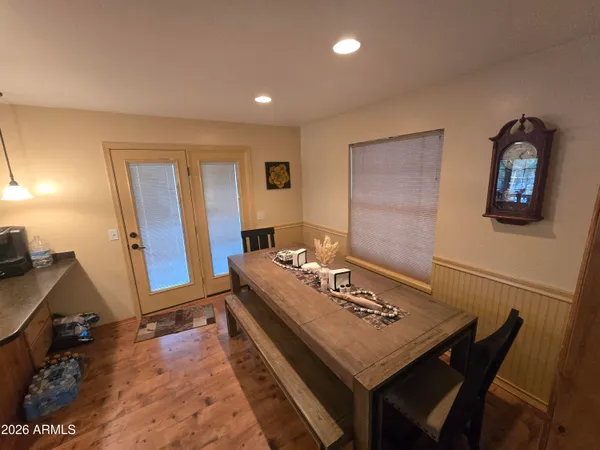 a view of a workspace with furniture