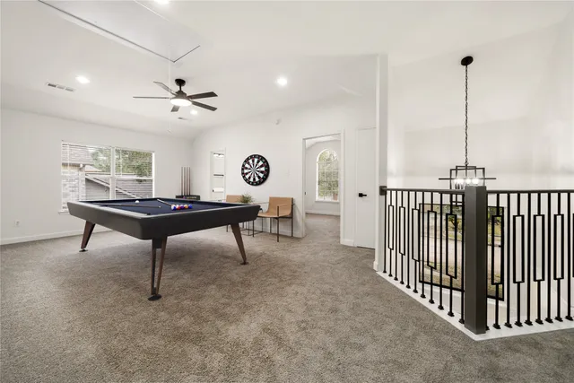 a workspace with furniture and a potted plant