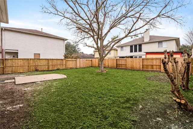an aerial view of residential building with parking space