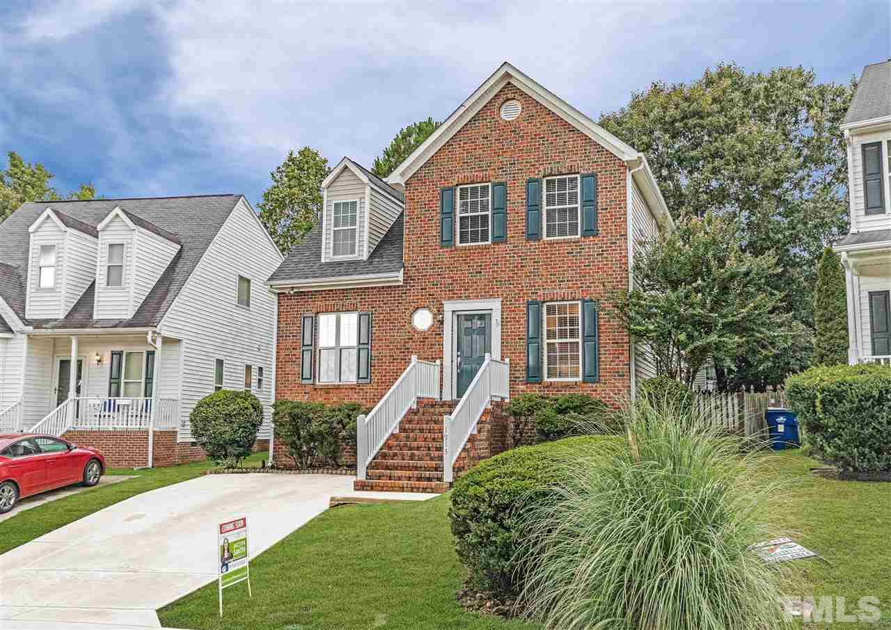 1913 Crag Burn Lane Raleigh, NC 27604 - Photo 1 of 29 a front view of a house with a yard