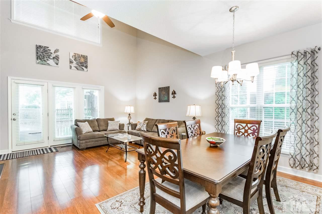 1913 Crag Burn Lane Raleigh, NC 27604 - Photo 13 of 29 a view of a dining room with furniture window and wooden floor