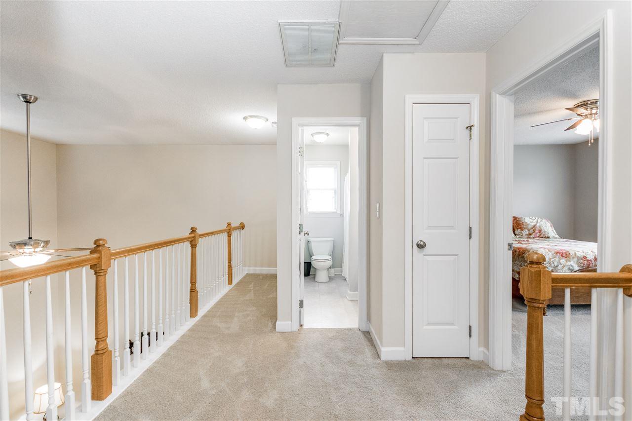 1913 Crag Burn Lane Raleigh, NC 27604 - Photo 14 of 29 a view of a hallway view with staircase