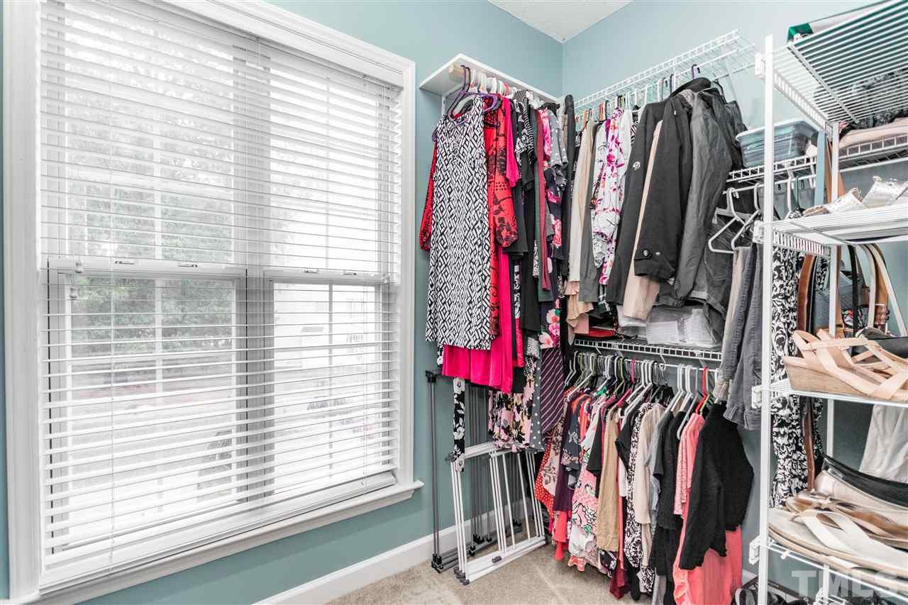 1913 Crag Burn Lane Raleigh, NC 27604 - Photo 17 of 29 a view of walk in closet with clothes