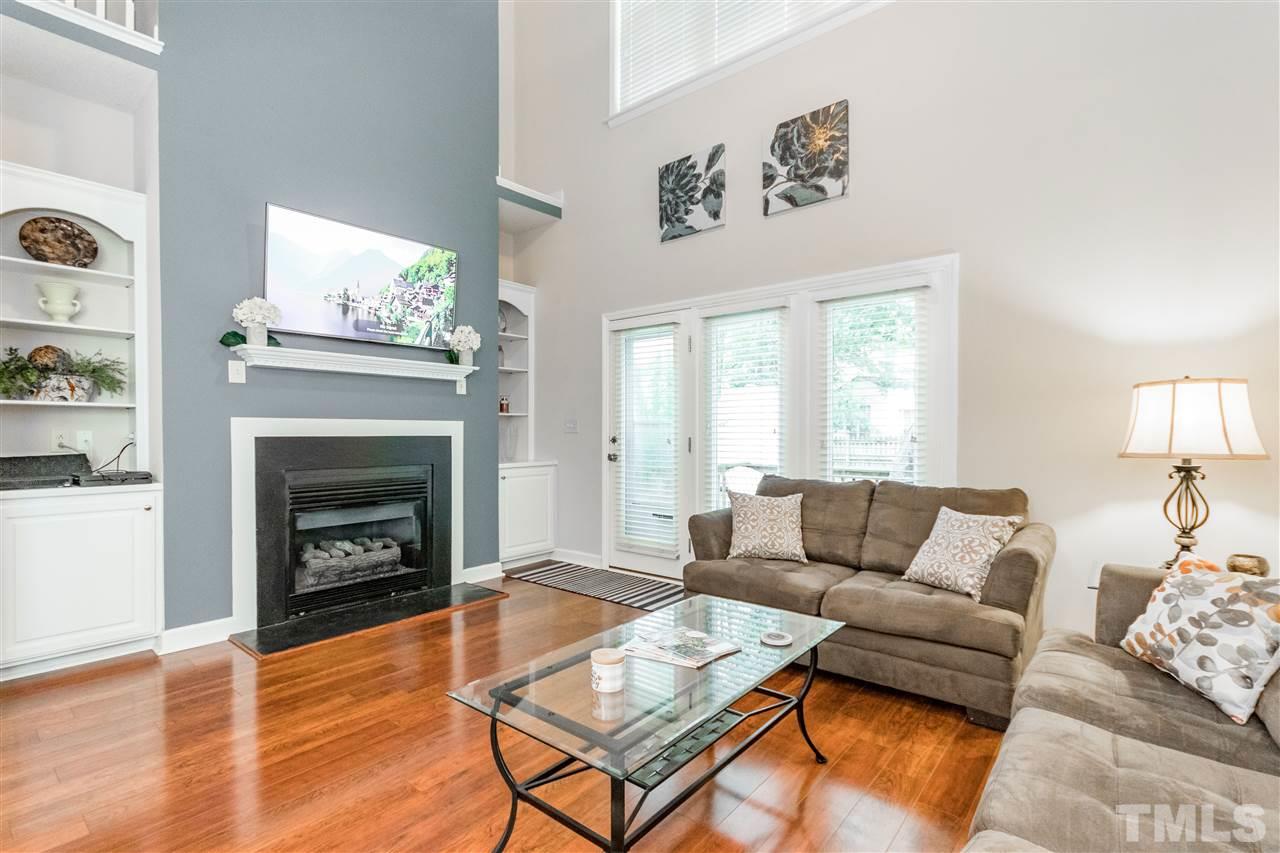 1913 Crag Burn Lane Raleigh, NC 27604 - Photo 7 of 29 a living room with furniture and a fireplace