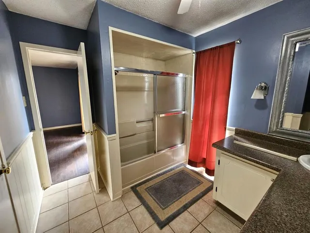 a view of a hallway with elevator