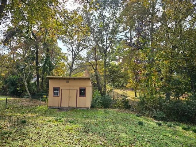 a fire hydrant in the middle of a field