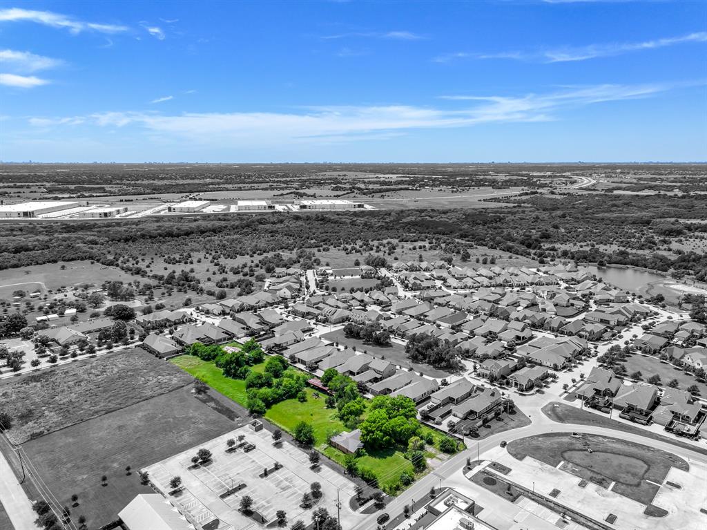 8701 Liberty Grove Road Rowlett, TX 75089 - Photo 1 of 18 a view of city and ocean