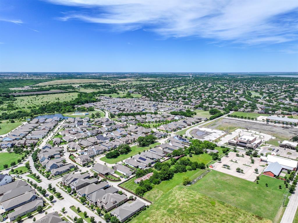 8701 Liberty Grove Road Rowlett, TX 75089 - Photo 12 of 18 an aerial view of a city with lots of residential buildings