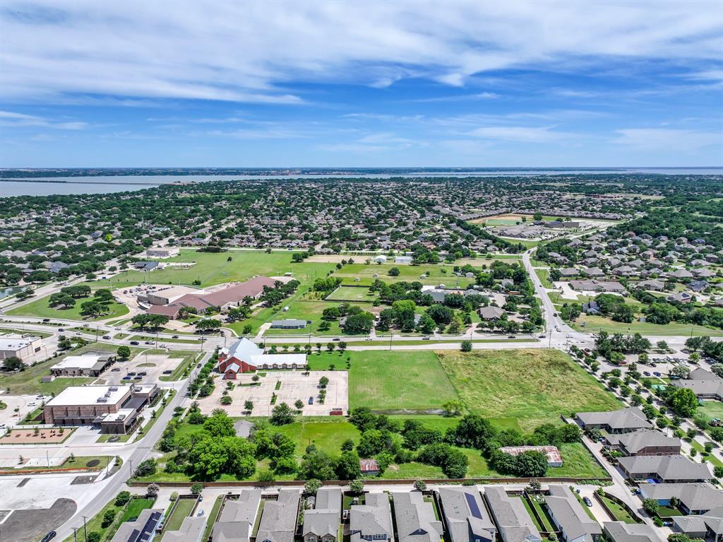 8701 Liberty Grove Road Rowlett, TX 75089 - Photo 13 of 18 an aerial view of residential building and car parked
