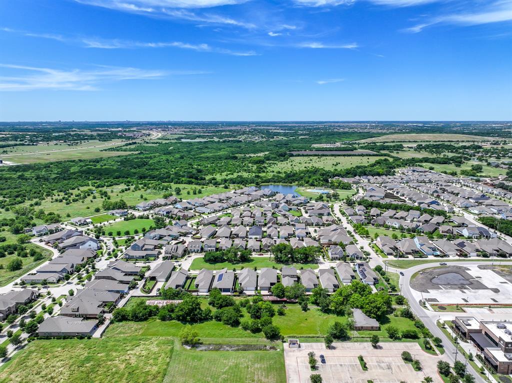8701 Liberty Grove Road Rowlett, TX 75089 - Photo 14 of 18 a view of a city with an ocean