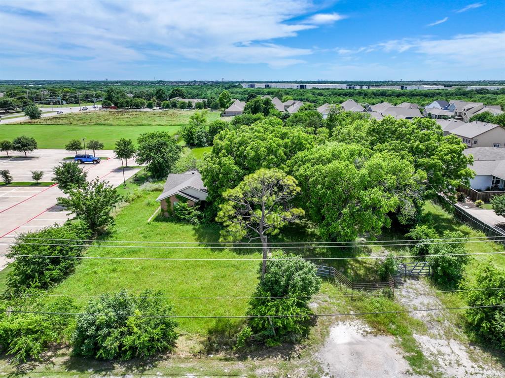 8701 Liberty Grove Road Rowlett, TX 75089 - Photo 17 of 18 a view of a city with lush green forest