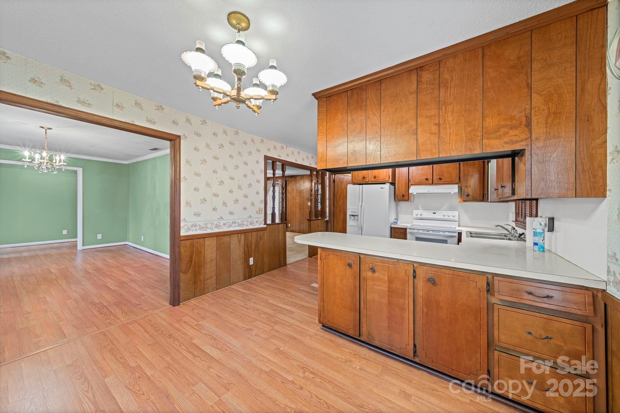 1902 Shady Lane Monroe, NC 28110 - Photo 11 of 36 a spacious bathroom with a granite countertop sink a mirror and a bathtub
