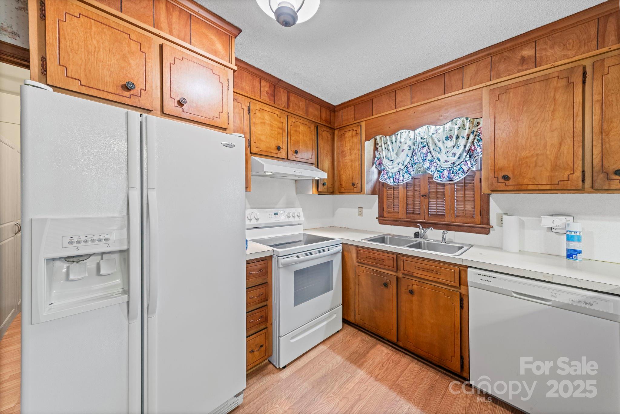 1902 Shady Lane Monroe, NC 28110 - Photo 14 of 36 a kitchen with a sink cabinets and window