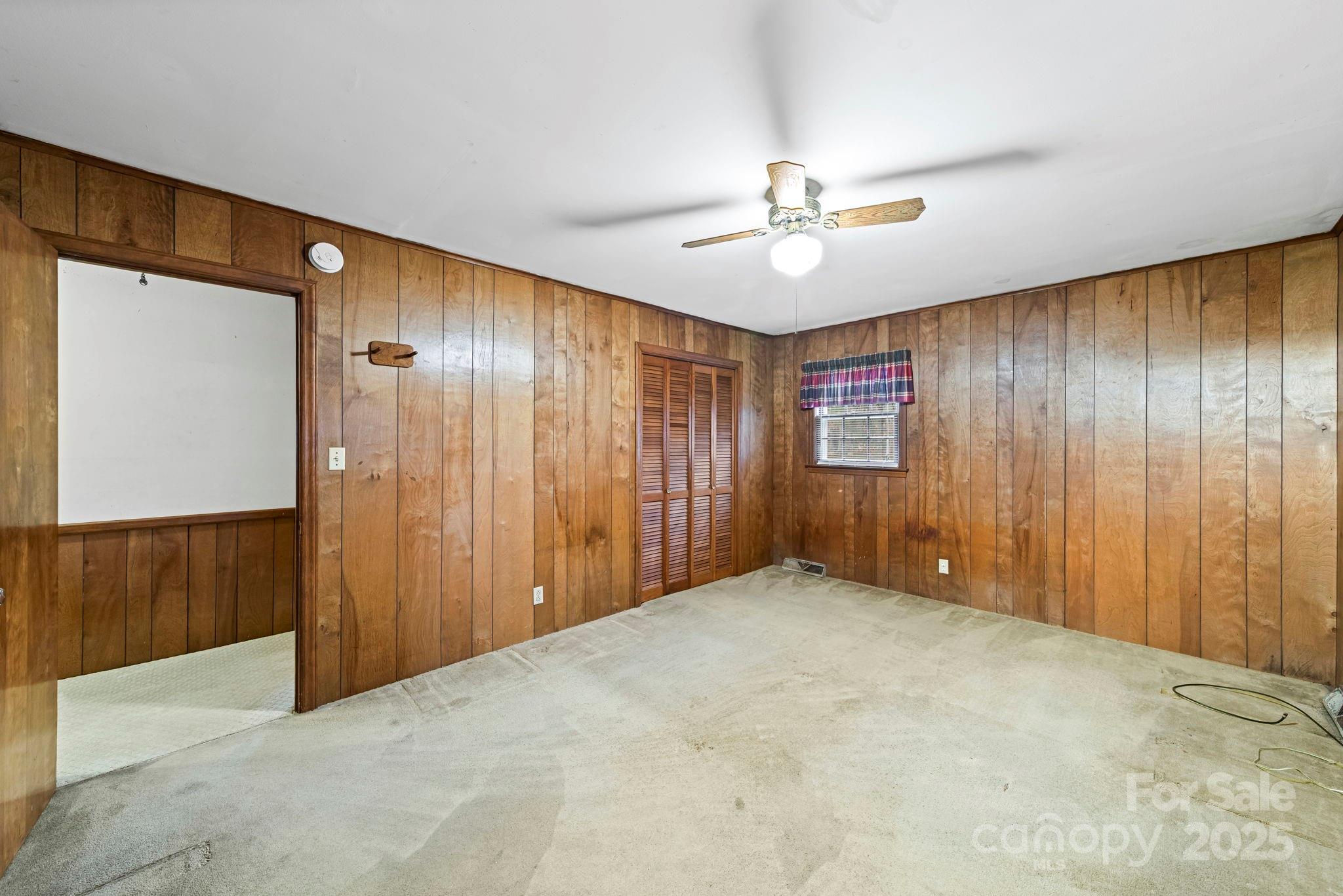 1902 Shady Lane Monroe, NC 28110 - Photo 18 of 36 a view of an empty room with a window