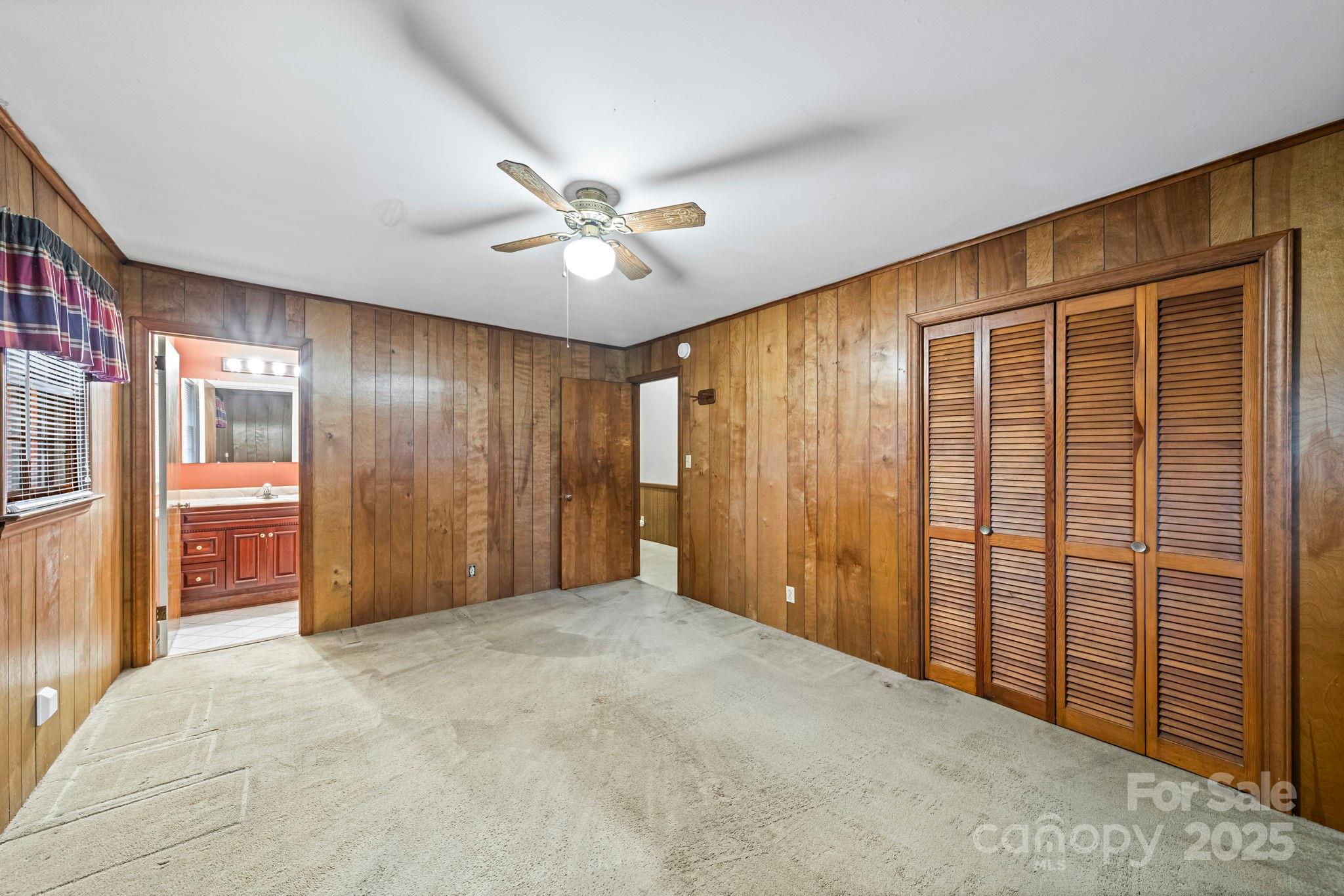 1902 Shady Lane Monroe, NC 28110 - Photo 19 of 36 a view of an empty room with a window