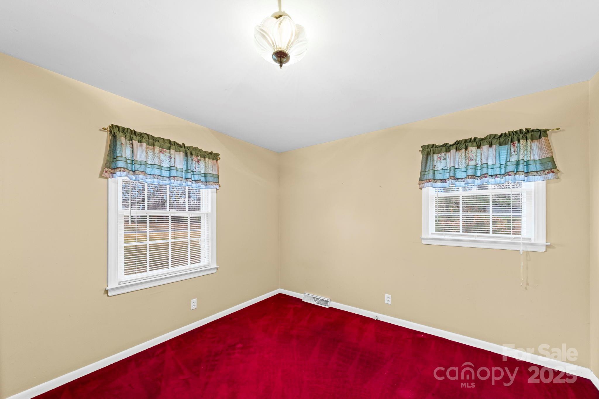 1902 Shady Lane Monroe, NC 28110 - Photo 24 of 36 a view of an empty room with a window