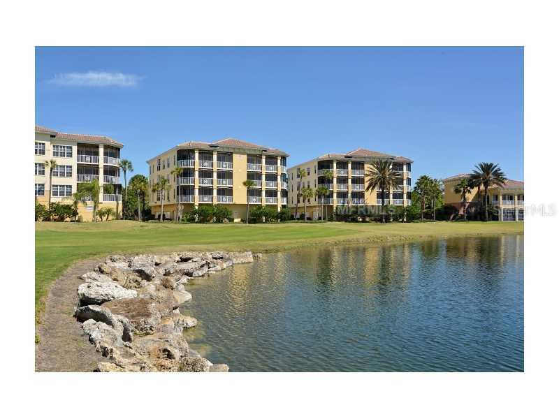 6370 Water Crest Way, Unit 401 Lakewood Ranch, FL 34202 - Photo 1 of 1 a view of swimming pool and outdoor space
