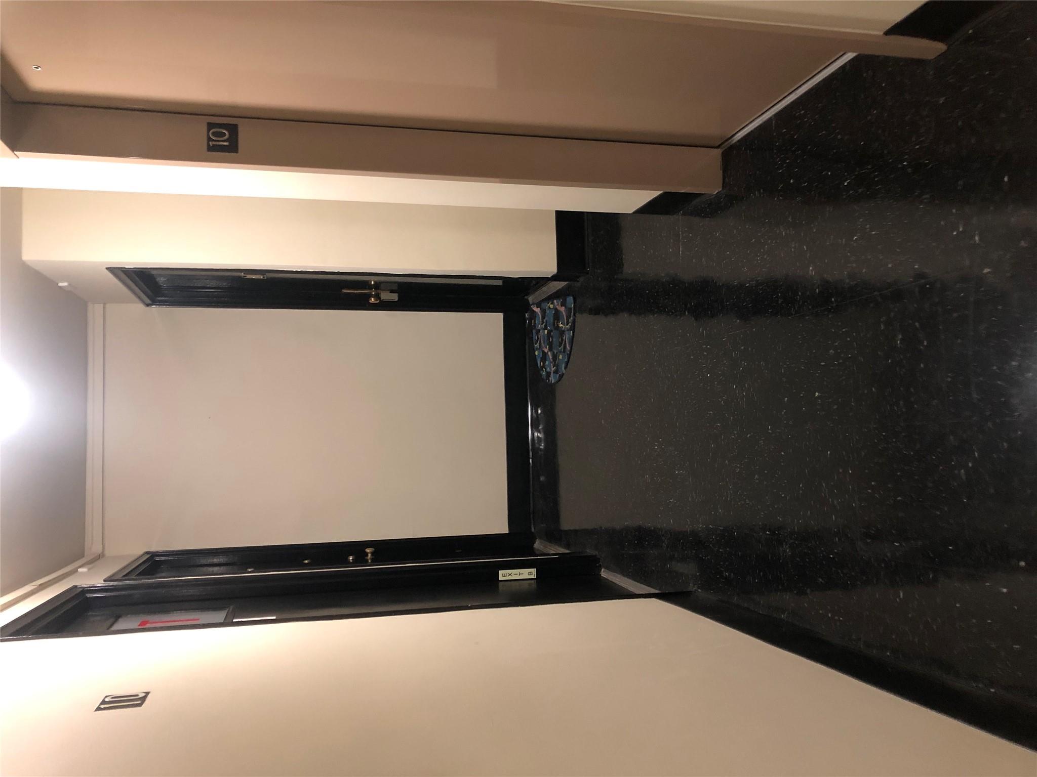 21-80 33rd Road, Unit 10A Queens, NY 11106 - Photo 13 of 14 an empty room with wooden floor